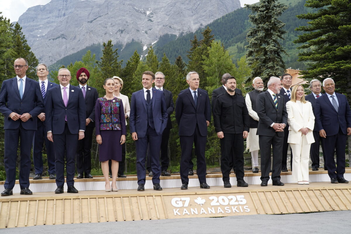 (L/R, top row) US Secretary of Treasury Scott Bessent, World Bank President Ajay Banga, European Commission President Ursula Von der Leyen, British Prime Minister Keir Starmer, South Korean President Lee Jae-myung, South African President Cyril Ramaphosa, Indian Prime Minister Narendra Modi, Japanese Prime Minister Shigeru Ishiba, UN Secretary General Antonio Guterres, NATO Secretary General Mark Rutte, (L/R, bottom row) German Chancellor Friedrich Merz, Australian Prime Minister Anthony Albanese, Mexican President Claudia Sheinbaum, French President Emmanuel Macron, Canadian Prime Minister Mark Carney, Ukrainian President Volodymyr Zelensky, Brazilian President Luiz Inacio Lula da Silva, Italian Prime Minister Giorgia Meloni and European Council President Antonio Costa pose for a family photo during the Group of Seven (G7) Summit at the Kananaskis Country Golf Course in Kananaskis, Alberta, Canada on June 17, 2025. (Photo by Geoff Robins / AFP)