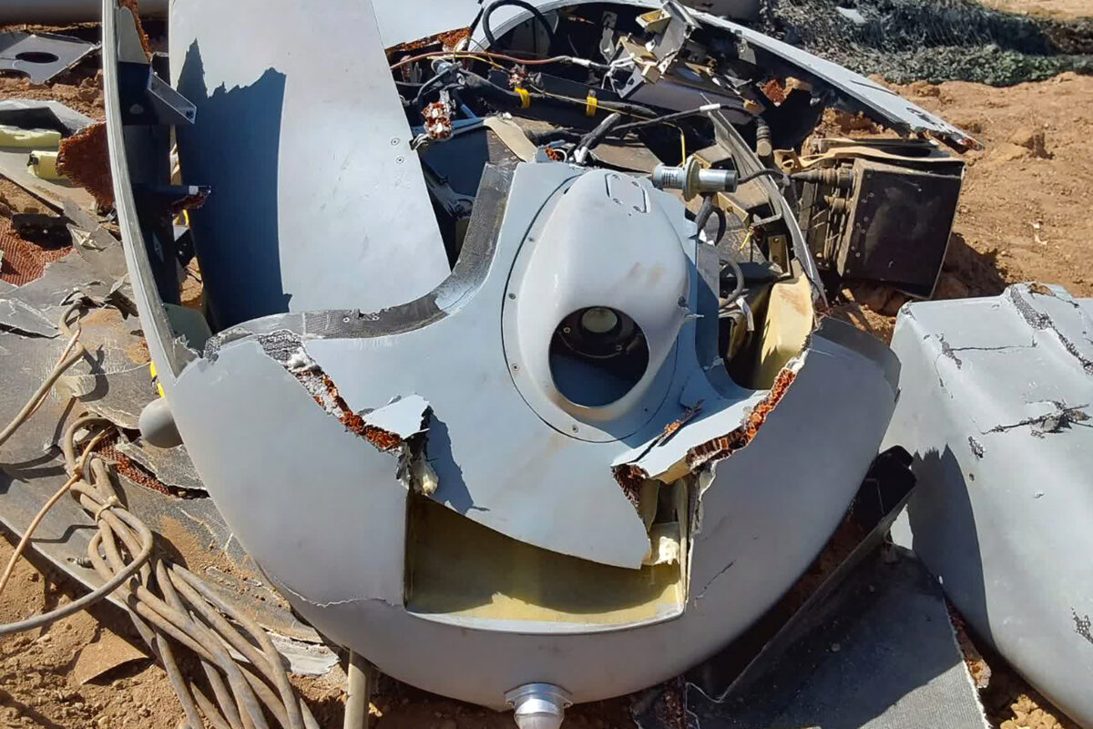 This handout picture provided by the Iranian Army media office on June 18, 2025, shows a detail from the wreckage of what the army said is an armed Israeli Air Force Hermes drone, downed after being hit by a surface-to-air missile, in the central city of Isfahan. The Israeli military said on June 18 that one of its drones had been downed while operating over Iran, the first such loss it has acknowledged since the start of hostilities last week. (Photo by Iranian Army Media Office / AFP) / === RESTRICTED TO EDITORIAL USE - MANDATORY CREDIT "AFP PHOTO / HO / IRANIAN ARMY MEDIA OFFICE" - NO MARKETING NO ADVERTISING CAMPAIGNS - DISTRIBUTED AS A SERVICE TO CLIENTS ===