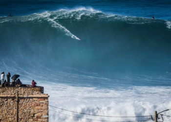 October 29, 2020, Nazare, Portugal: Big wave surfer Sebastian Steudtner from Germany rides a wave during a tow surfing session at Praia do Norte on the first big swell of winter season. (Credit Image: © Henrique Casinhas/SOPA Images via ZUMA Wire