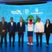 Garibaldy bautista, luis mejía, kelvin cruz, leonardo aguilera, la mascota colí, josé monegro, alieska díaz y josé ramos en el lanzamiento de la campaña institucional de los juegos centroamericanos y del caribe 2026.