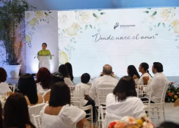 Durante el evento, palabras de la presidenta del voluntariado.